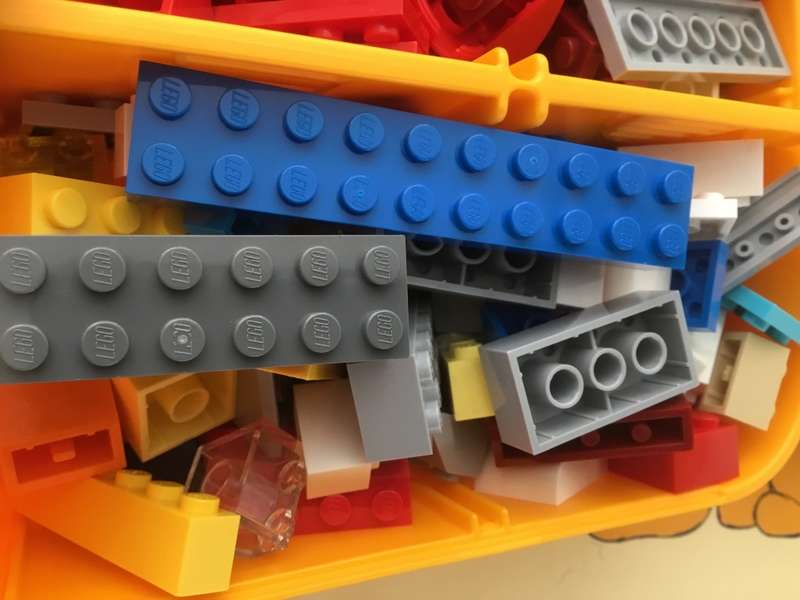 Lego blocks in yellow lego box