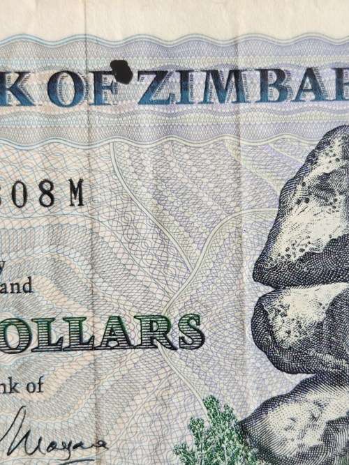Zimbabwe 20 Dollars Bird Watermark Harare 1983 (hole in centre of note) - as per photograph