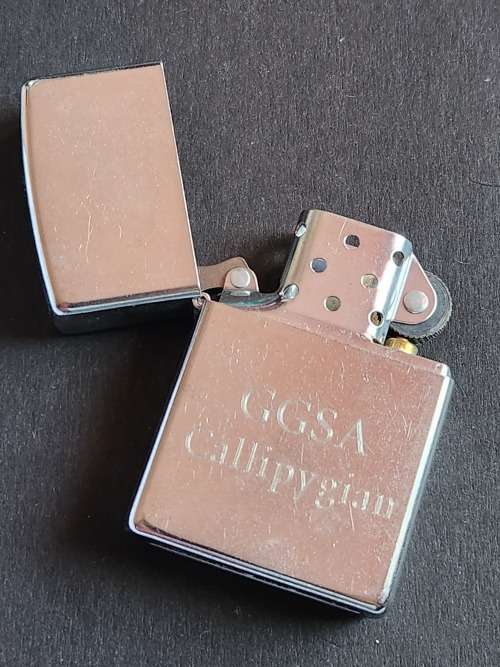 Zippo Stainless Steel engraved GGSA Callipygian Lighter (mint condition) - as per photograph