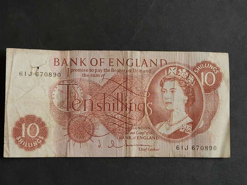 Bank of England 10 Shillings (tear top left side of note) - as per photograph