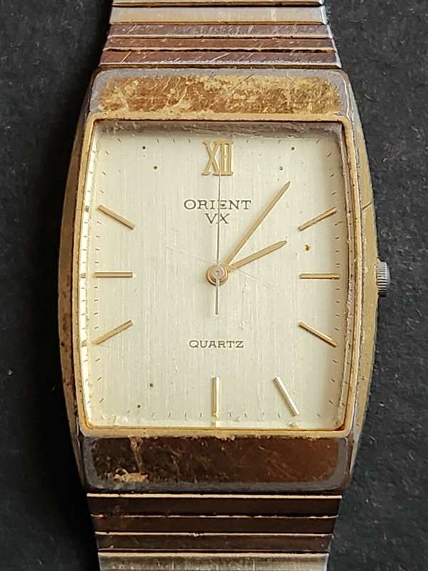 Vintage Men`s Orient VX Quartz Watch (not working) - as per photograph