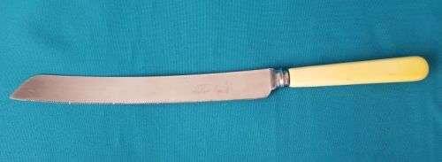 VINTAGE BONE HANDLE BREAD KNIFE (SHEFFIELD, ENGLAND)