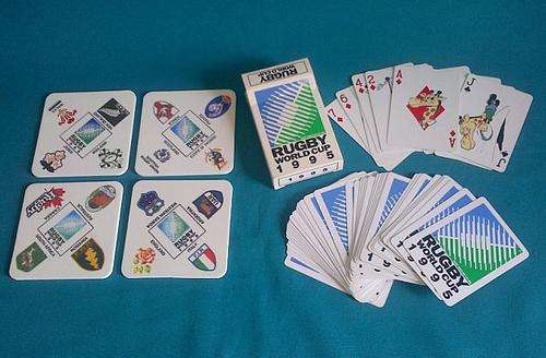 SET OF 4 RUGBY WORLD CUP 1995 COASTERS + BOX OF PLAYING CARDS