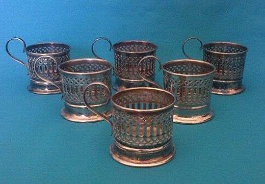 SET OF 6 SILVER PLATED E.P.N.S GLASS HOLDERS