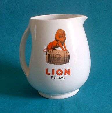 OLD "LION BEERS" PORCELAIN JUG (MADE IN ENGLAND)