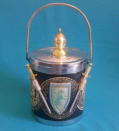 METAL ORNATE "ARMOUR" ICE BUCKET WITH SWORD DETAIL