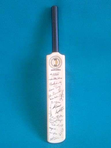 MINIATURE S.A. CRICKET BAT WITH 18 SIGNATURES (HANSIE CRONJE ETC.)