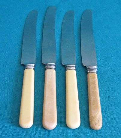 4 ASSORTED OLD BONE HANDLE DINNER KNIVES