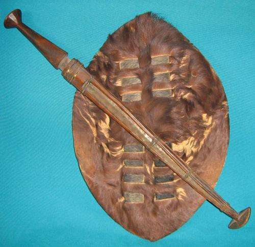 INTERESTING 100 YEAR OLD ZULU ARTEFACT (SHIELD + DAGGER)