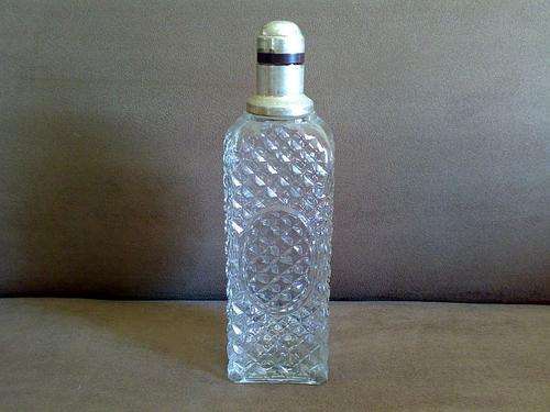 OLD CUT GLASS DECANTER WITH SILVER PLATED TOP