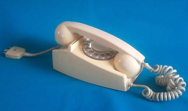 OLD IVORY COLOURED TELEPHONE