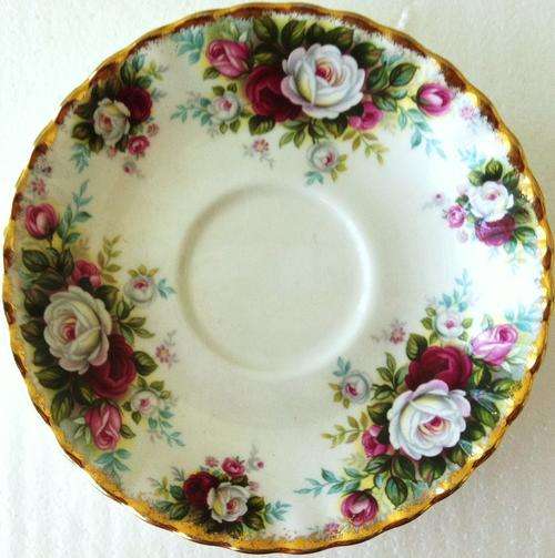 ROYAL ALBERT CELEBRATION SAUCER, MARKED (Small chip on the underside)