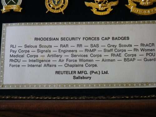 RHODESIA - REUTELER SET OF UDI RHODESIAN ARMED FORCES BADGES IN ORIGINAL LEATHER CASE  (4471)