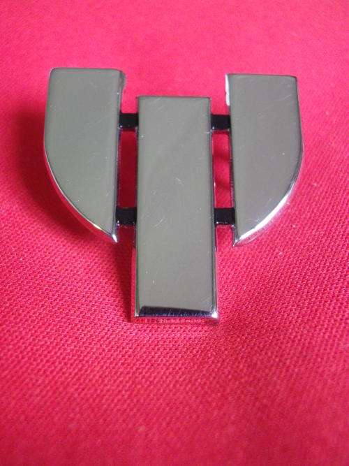 RHODESIAN PSYCHOLOGICAL OPERATIONS UNIT - CHROME CAP BADGE - STAMPED  REUTELER   (V163)