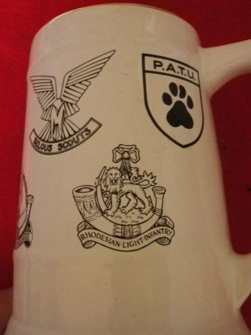 RHODESIA ARMED FORCES MUG - HAS MAIN BUSH WAR UNITS - MADE WILLSGROVE  MINOR CHIP ON BASE (5290)