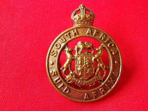 SOUTH AFRICAN INSTRUCTIONAL CORPS. -GILDING METAL COLLAR BADGE WORN PRE 1952