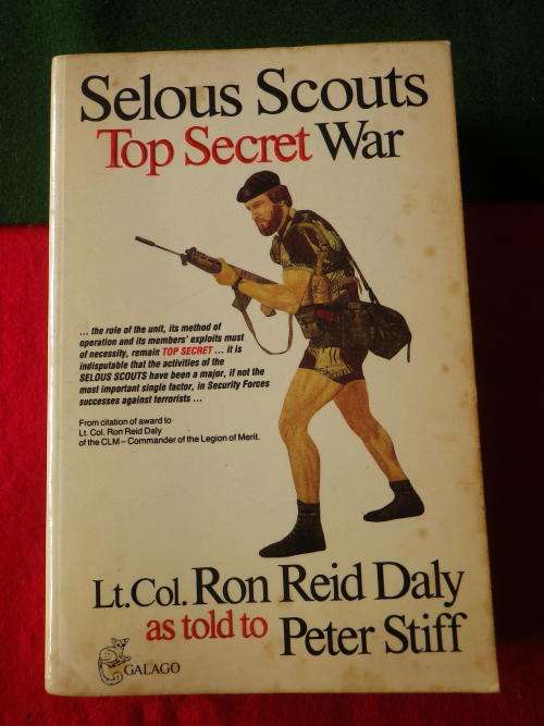 RHODESIA - SELOUS SCOUTS TOP SECRET WAR PAPERBACK - SIGNED BY LT. COL. RON REID DALY.  - HAS FOXING