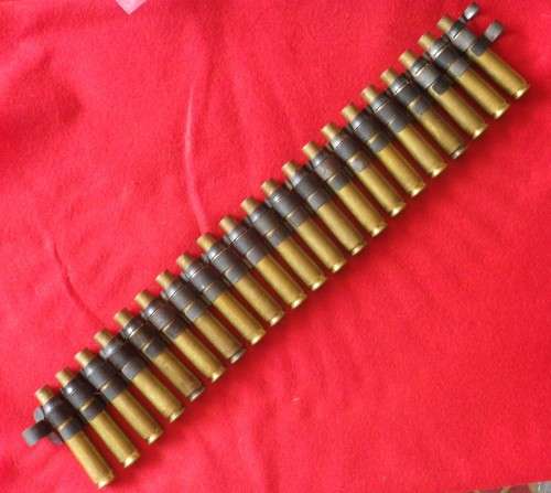 SA BORDER WAR - 20 ROUND 12.7mm CASES IN LINK BELT - SEE PICS FOR MARKINGS   (4104)