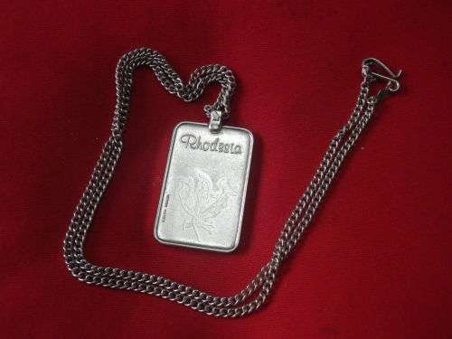 RHODESIAN STAMPED SILVER PENDANT + CHAIN - FLAME LILY + NATIONAL ANTHEM - MADE REUTELER  (6182)