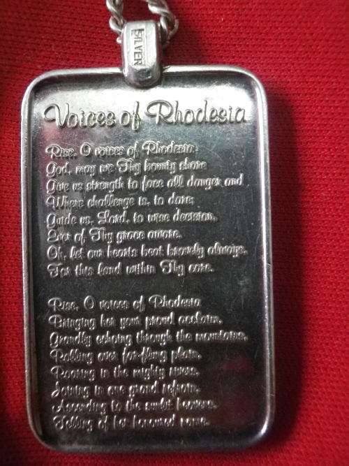 RHODESIAN STAMPED SILVER PENDANT + CHAIN - FLAME LILY + NATIONAL ANTHEM - MADE REUTELER  (6182)
