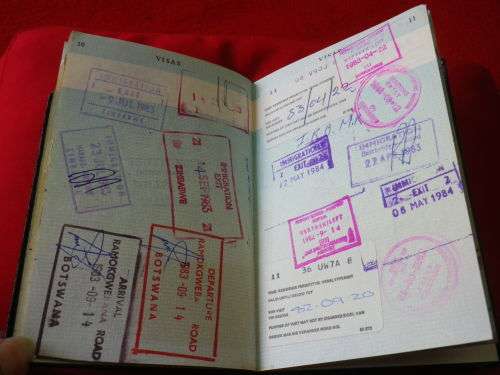 DUEL BRITISH PASSPORT - ISSUED TO 2 RHODESIAN CITIZENS EXPIRED 1975 EXTENDED 1985 (6520)