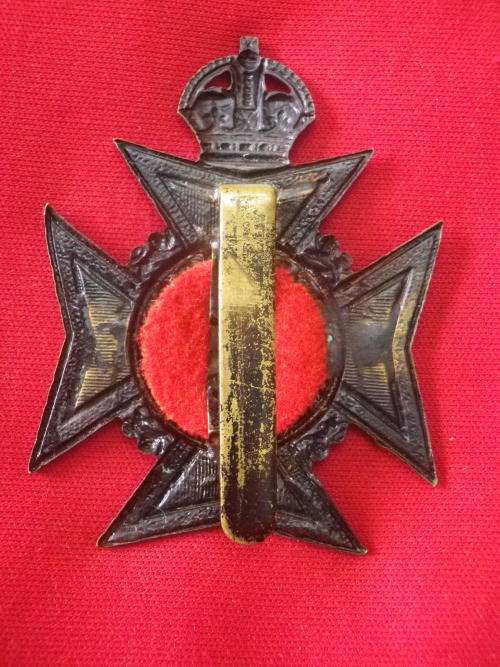 RHODESIA REGT - BLACKENED BRASS HELMET PLATE 1927-47     (3978)