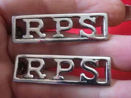 RHODESIA PRISON SERVICES - PAIR OF CHROMED SHOULDER TITLES     (7559)