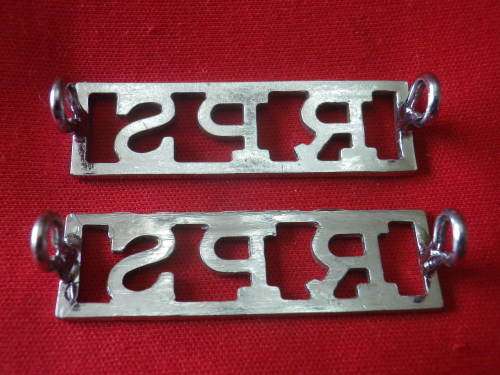 RHODESIA PRISON SERVICES - PAIR OF CHROMED SHOULDER TITLES     (7559)
