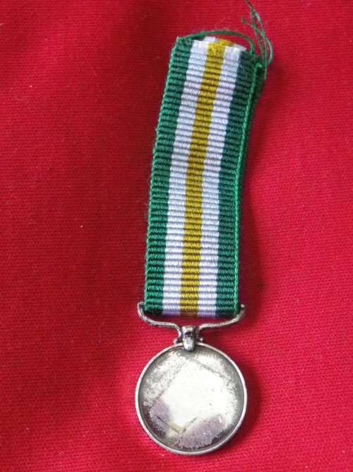 RHODESIA - INDEPENDENCE DECORATION MEDAL (ID)   SOME TARNISH ON BACK    - MINIATURE MEDAL     (7929)