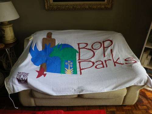 BOPHUTHATSWANA PARKS FULL SIZED FLAG  -  180 x 120CM - HAS STAINING + MINOR HOLES          (6080)