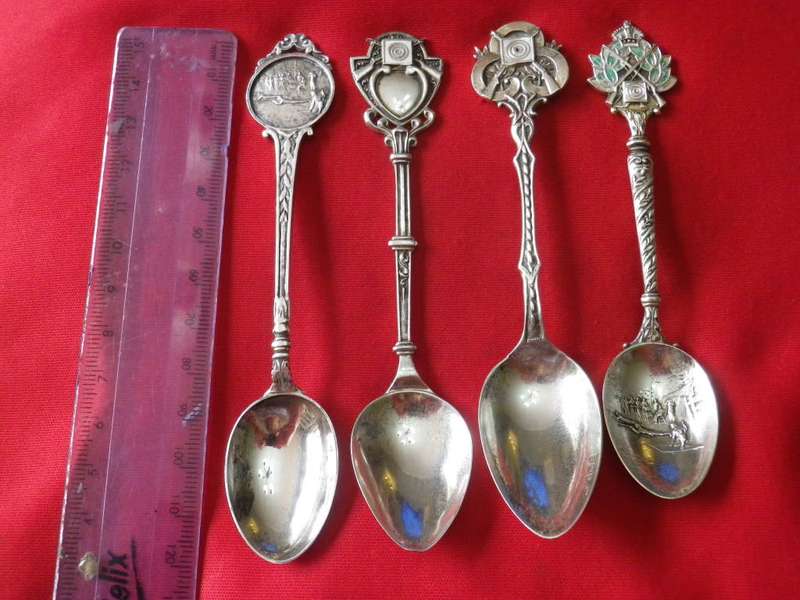 BRITAIN + GB EMPIRE - 4 X SILVER PLATE SHOOTING TEASPOONS          (8355)