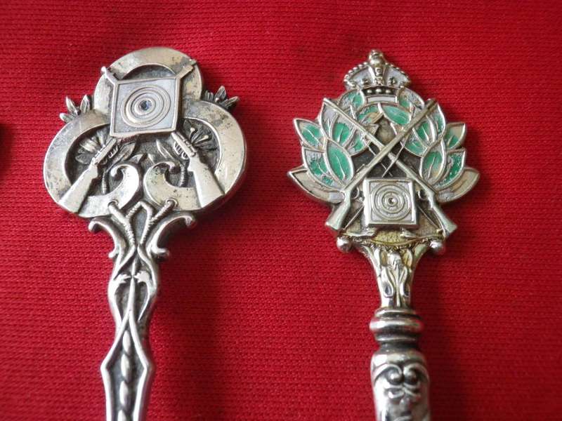 BRITAIN + GB EMPIRE - 4 X SILVER PLATE SHOOTING TEASPOONS          (8355)