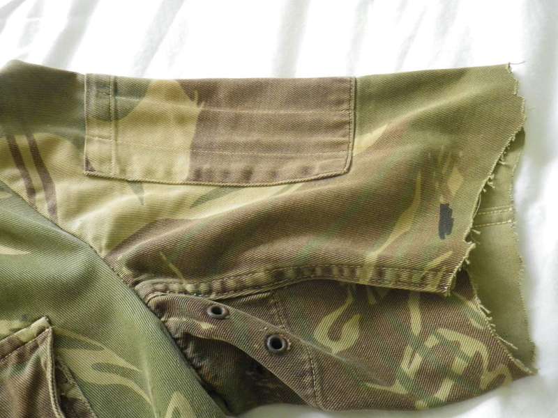 RHODESIAN ARMY JACKET MODIFIED TO BUNNY - SLEEVES CUT OFF, AS USED - SOME FREYING/MINOR HOLE (8437)