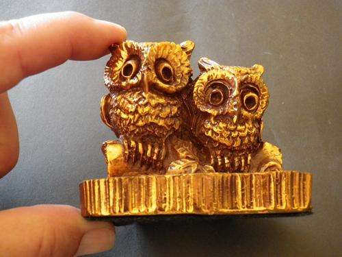 PAIR OF OWLS ON A LOG