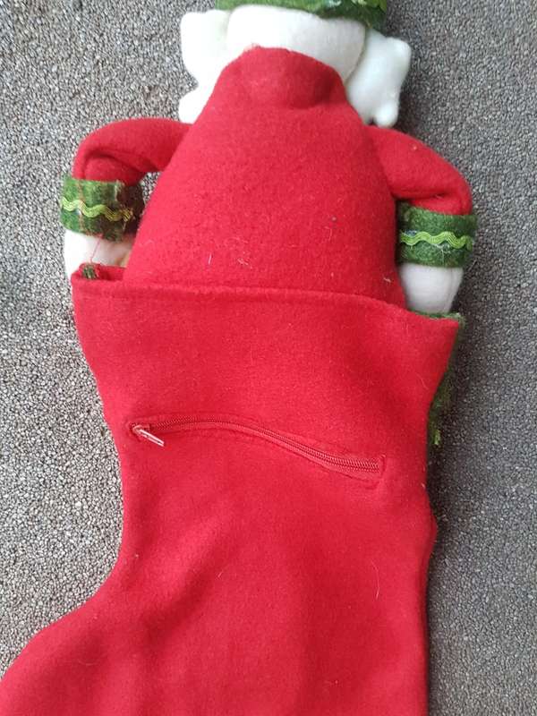 Cute Father Christmas stocking Closes with a zip at the back