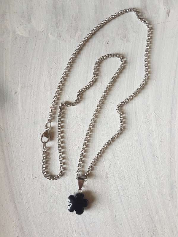 Stainless steel necklace with natural black onyx flower pendant