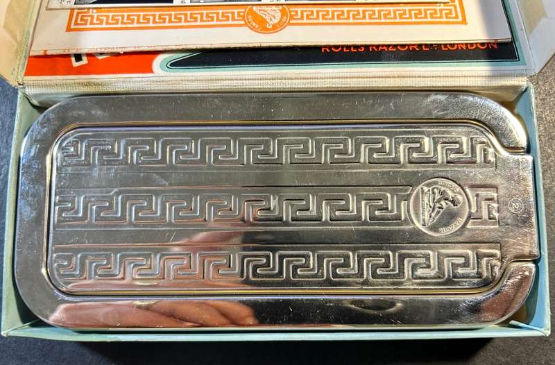 Antique Rolls Razor.
