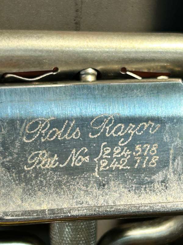 Antique Rolls Razor.