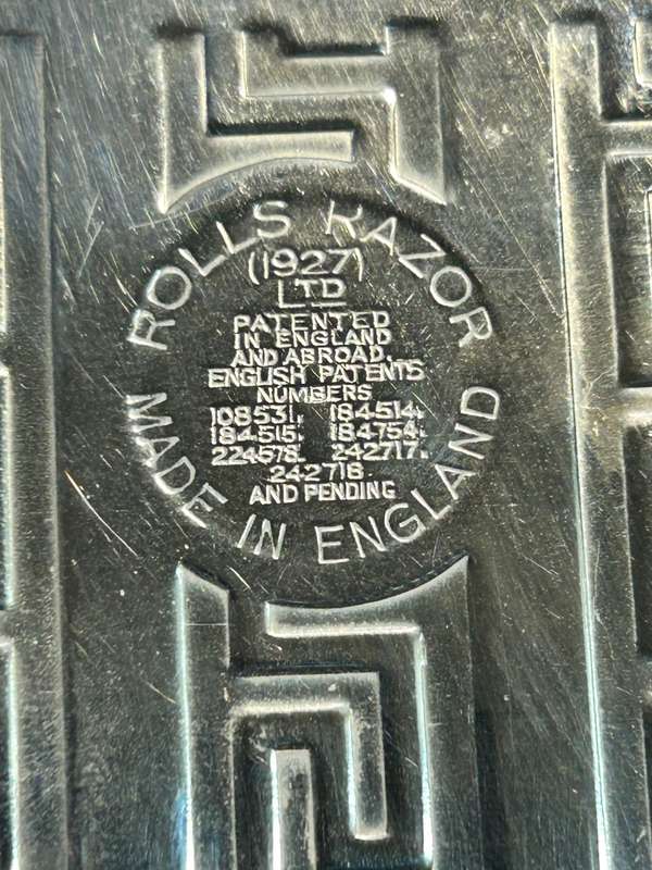 Antique Rolls Razor.