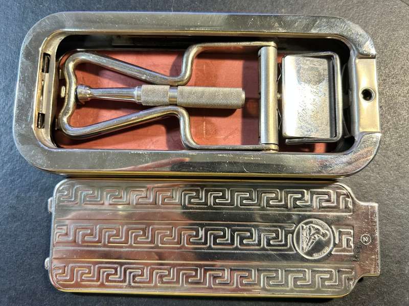 Antique Rolls Razor.