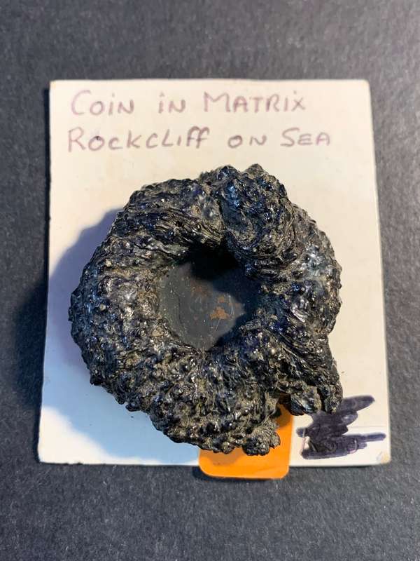 Coin in Rockcliff out of the ocean