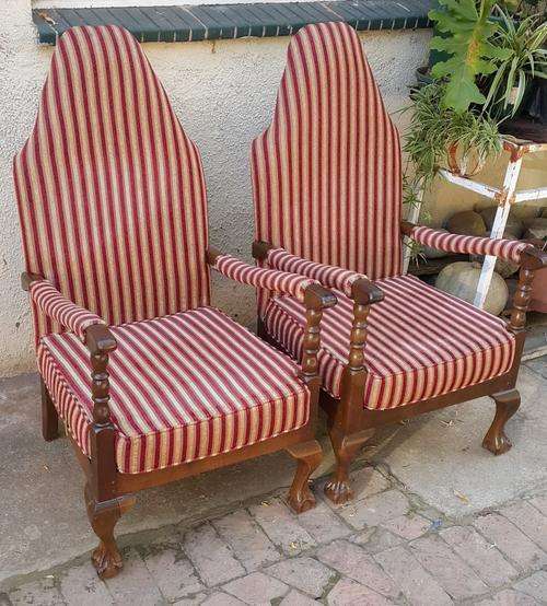 Two beautiful high back ball and claw chairs