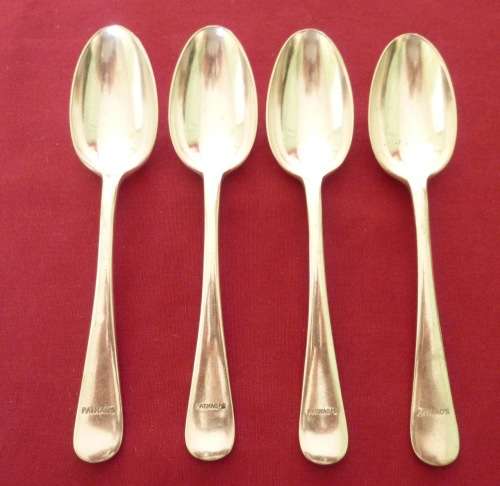 Set of four silver plated dessert spoons