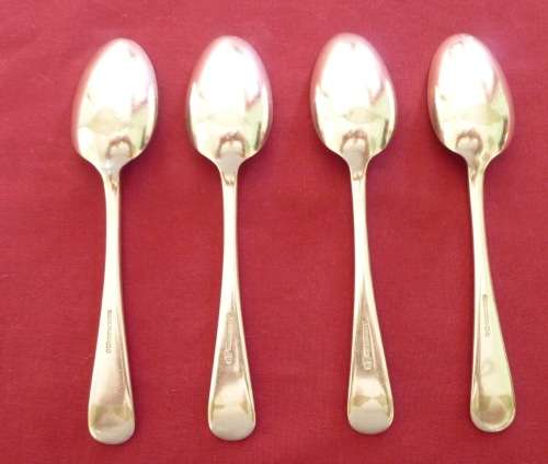 Set of four silver plated dessert spoons