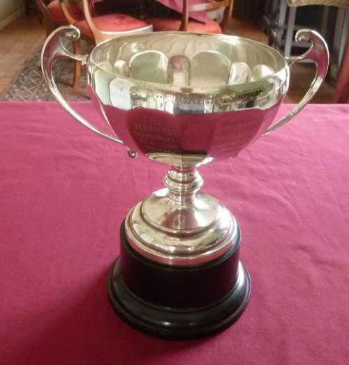 Large silver plated trophy on stand