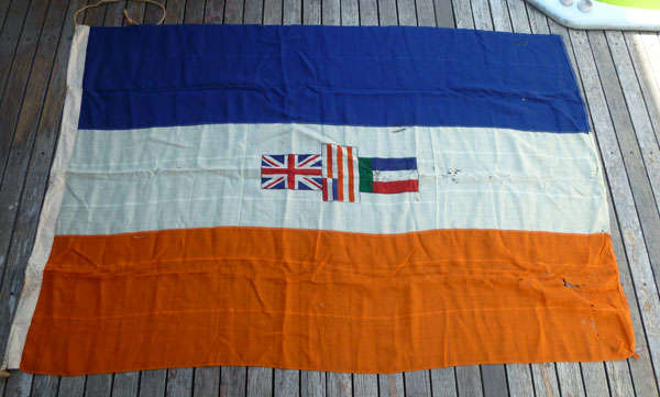 A large old South African flag