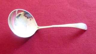 Small silver sauce ladle