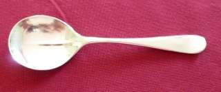 Unusual silver sauce spoon