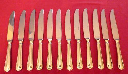 Set of 12 silver plated table knives
