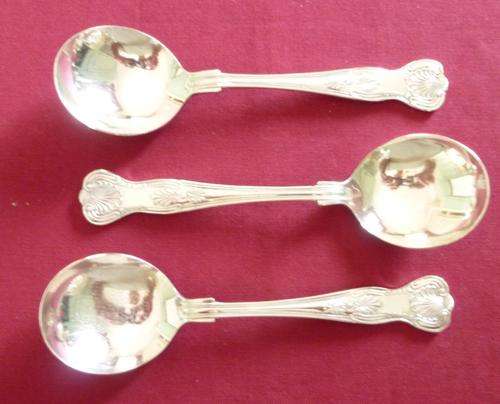 Three kings pattern soup spoons